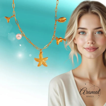 Goudkleurige damesketting met zee - bedels en parel – 45 cm - ket1170 - 511142 - Halskettingen kopen# - 45cm - alles - Bedelketting