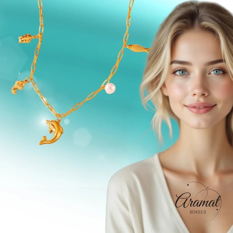 Goudkleurige damesketting met zee - bedels & parel – 45 cm - ket1175 - 511146 - Halskettingen kopen# - 45cm - alles - Bedelketting