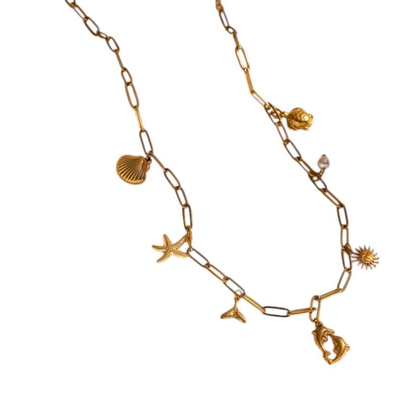 Goudkleurige ketting met parel & dolfijn bedels - 40cm - ket1163 - 599159 - Halskettingen kopen# - 40cm - alles - Bedelketting
