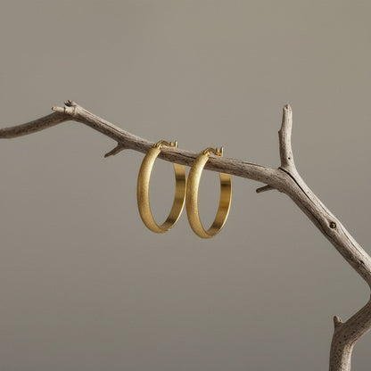 Goudkleurige Matte RVS Oorringen Sandblasted - 30 mm - Aramat Jewels - Oorringen - cadeautip