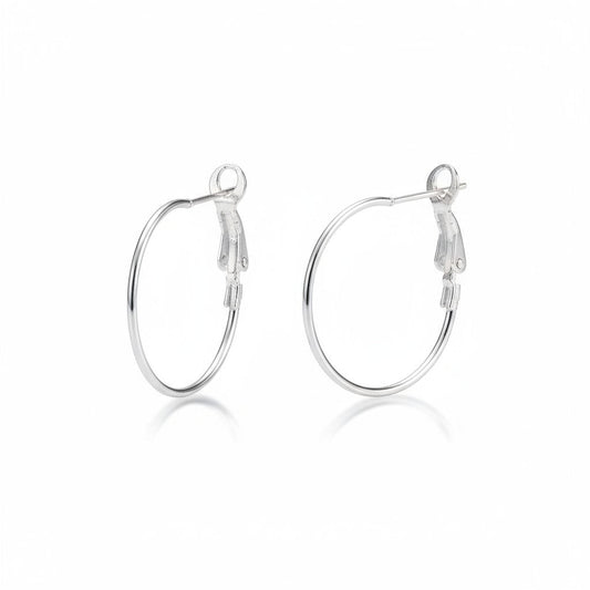 Zilverkleurige metalen oorringen 25mm met klapscharnier, lichtgewicht en personaliseerbaar met oorbedels voor dames