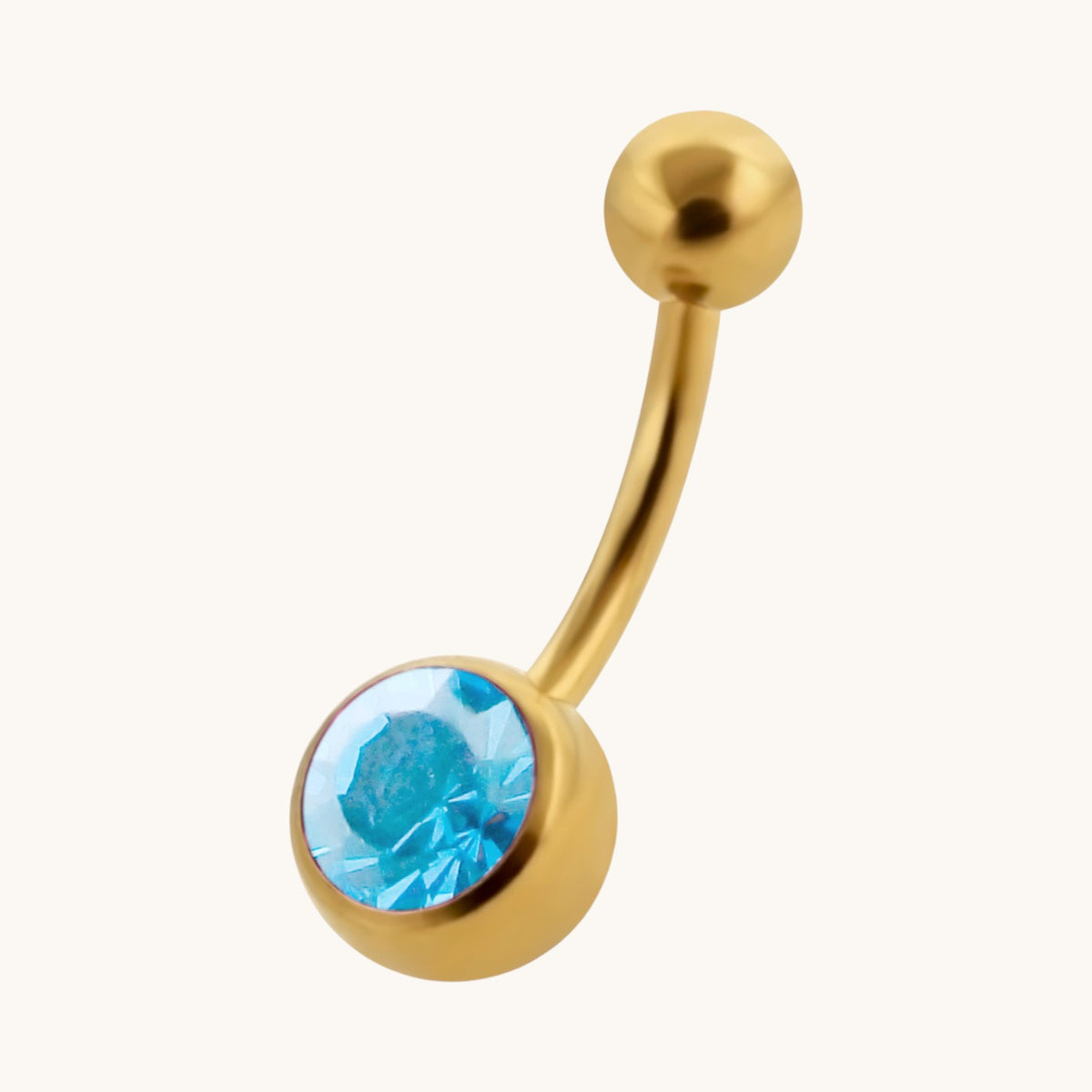 Piercing au nombril avec pierre de zircone couleur or