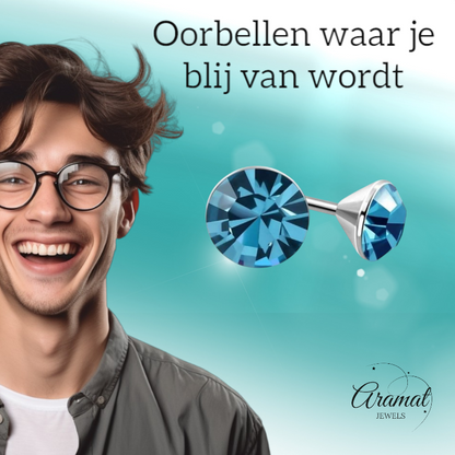 Steel Crystal Earrings with sapphire blue stone – Silver color – 3mm