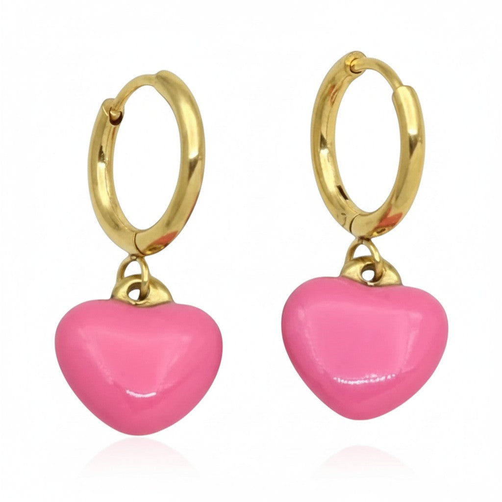 Gold-colored earrings with pink heart