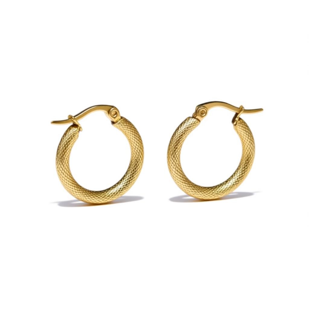 Steel hoop earrings with diamond pattern, gold color