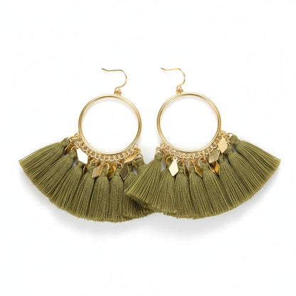 Boucles d'oreilles à pompons avec breloques en diamant