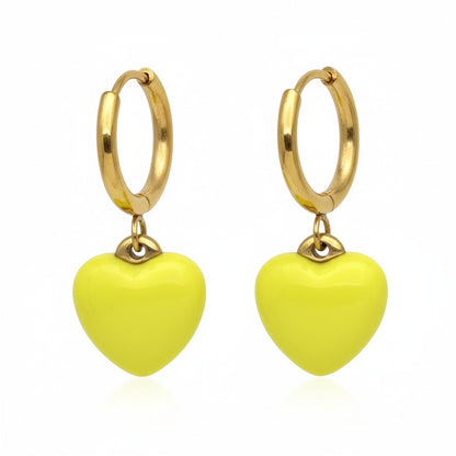 Gold-colored earrings with yellow heart