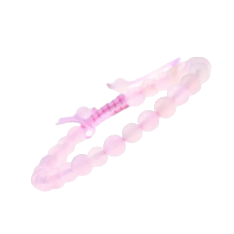 Een roze armband met een enkele bea