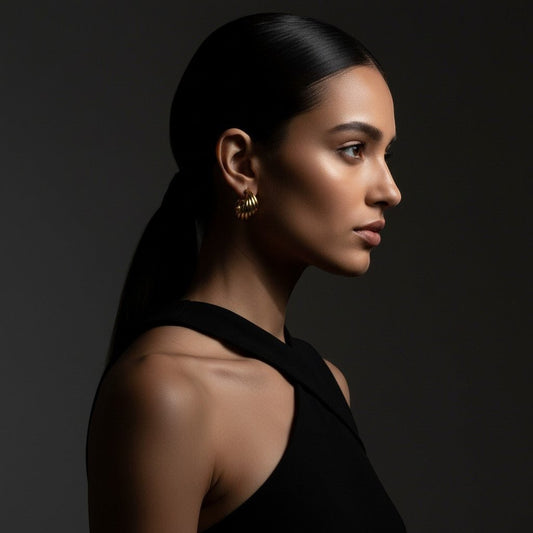 RVS Goudkleurige Halve Oorringen 22x15mm - 5 Lijnen Twist - Aramat Jewels - Oorbellen - cadeautip