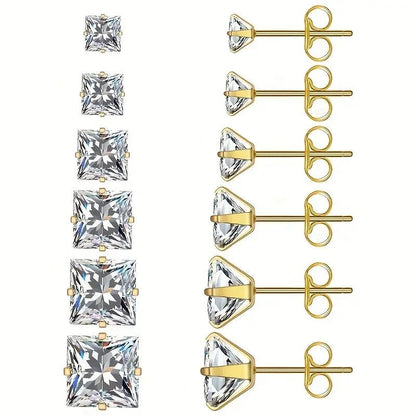 Gouden oorbellen met princess-geslepen kristallen in verschillende maten.