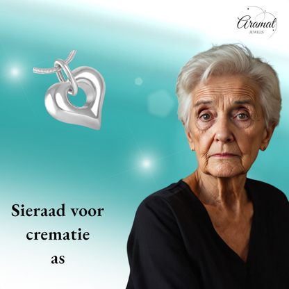 Heart-shaped ash jewelry with open detail – steel