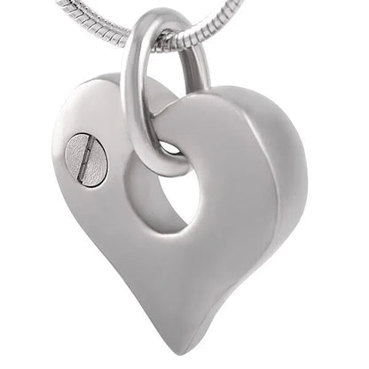 Heart-shaped ash jewelry with open detail – steel