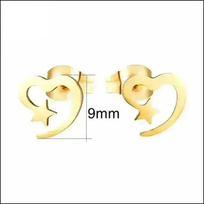 Goudkleurige bassleutel oorbellen.