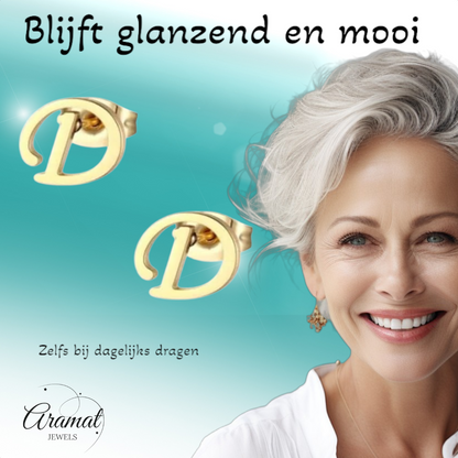 Gold-colored stainless steel ear studs Letter D