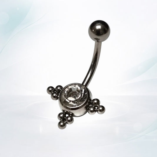 Piercing au nombril avec points de zircone transparente
