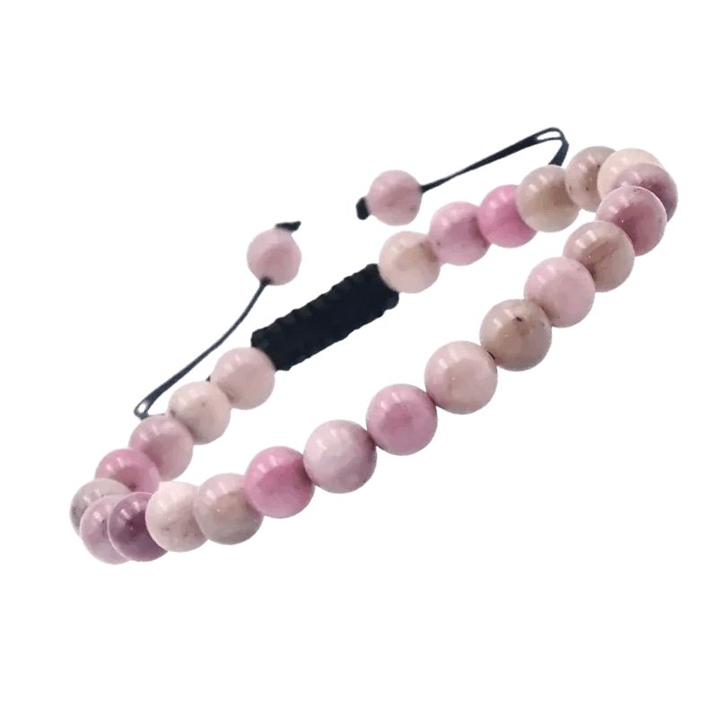 Een roze armband met een zwart koord