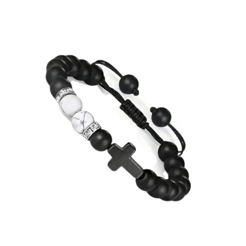 Een zwart-witte armband met een doodshoofd