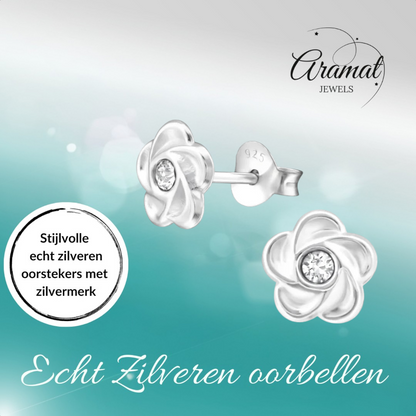 Silver flower earrings with transparent crystal