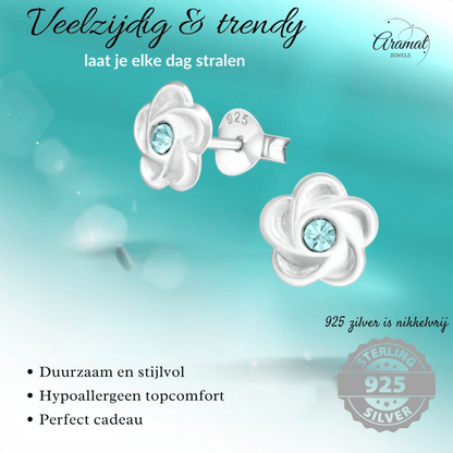 Zilveren bloemen oorstekers met blauwe kristal - Aramat Jewels - Oorbellen - cadeautip