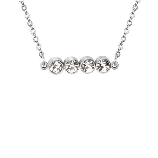 Een zilveren ketting met drie cirkels eraan