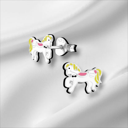 Aramat Jewels silver horse stud earrings with white, yellow, and pink enamel details and a black bow tie.