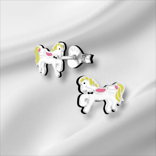 Aramat Jewels silver horse stud earrings with white, yellow, and pink enamel details and a black bow tie.