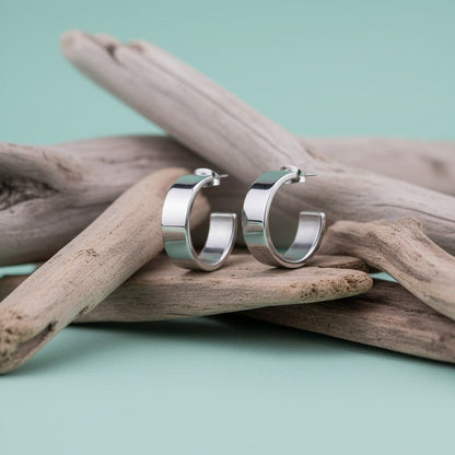 Zilverkleurige Halve RVS Oorringen Glad Design 28x7mm - Aramat Jewels - Oorringen - cadeautip