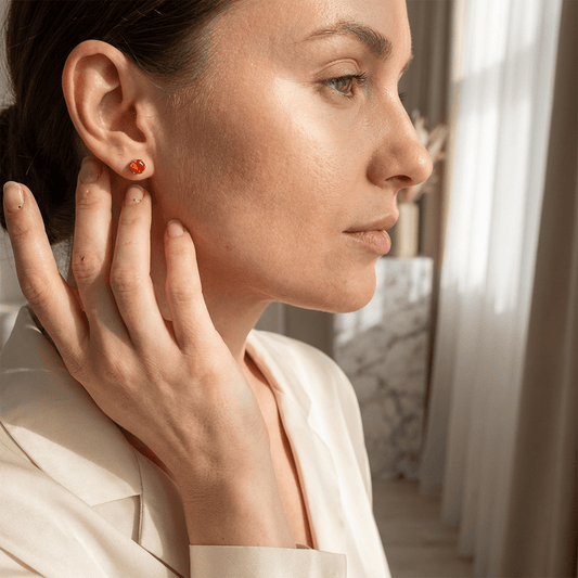 Zilverkleurige RVS Oorstekers Geboortesteen Juli - Rood/Oranje - 4 mm - Aramat Jewels - Oorbellen - cadeautip