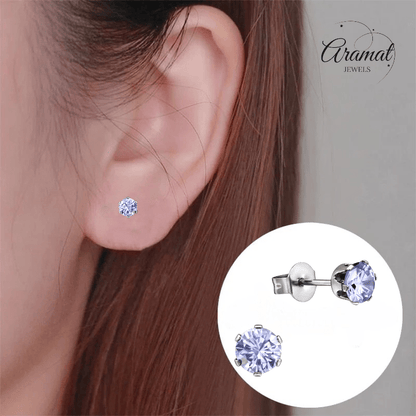 Zilverkleurige Zirkonia Oorbellen 5mm Lila - Aramat Jewels - Oorbellen - cadeautip